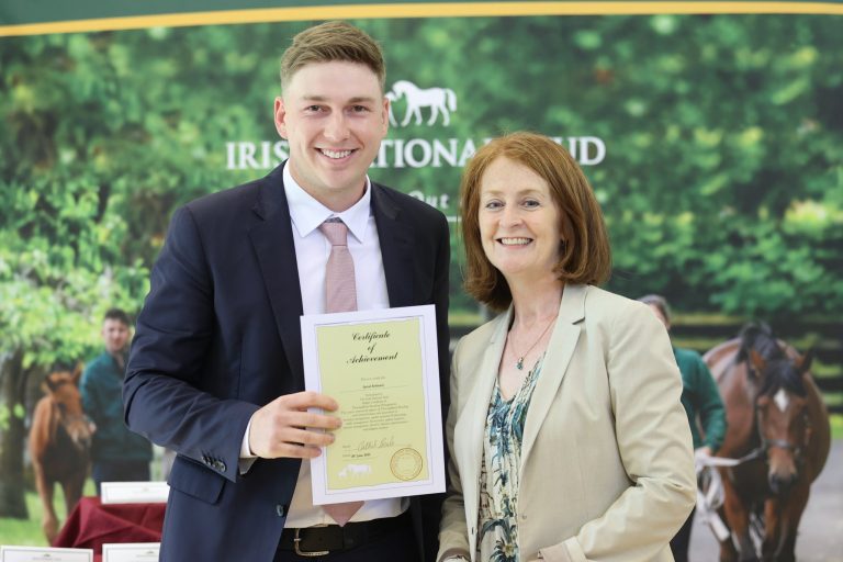 Jarrod Robinson receiving his Irish National Stud graduation certificate.